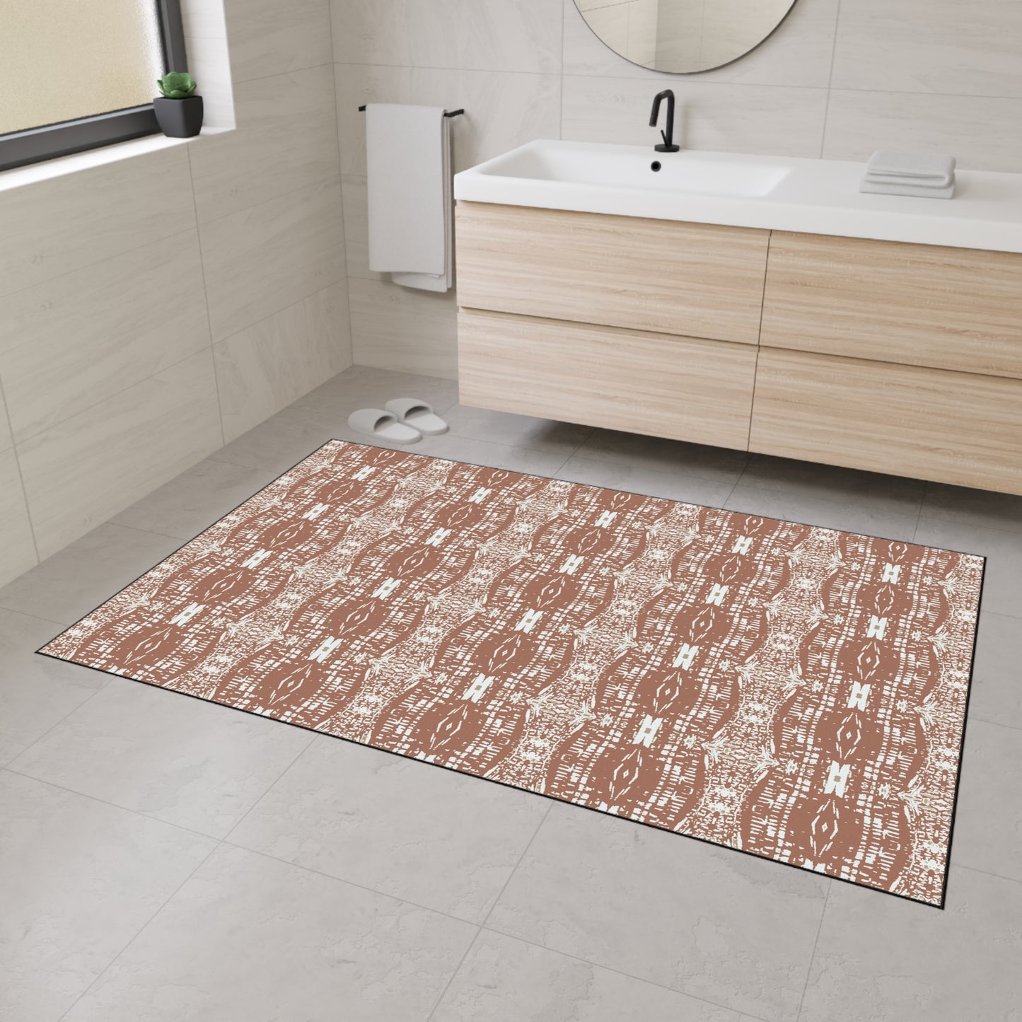a heavy duty rug/mat on a bathroom floor featuring the design by elizabeth domogala named Half Bamboo© in mocha. The mat is set in a bathroom with a vanity and mirror in the background.
